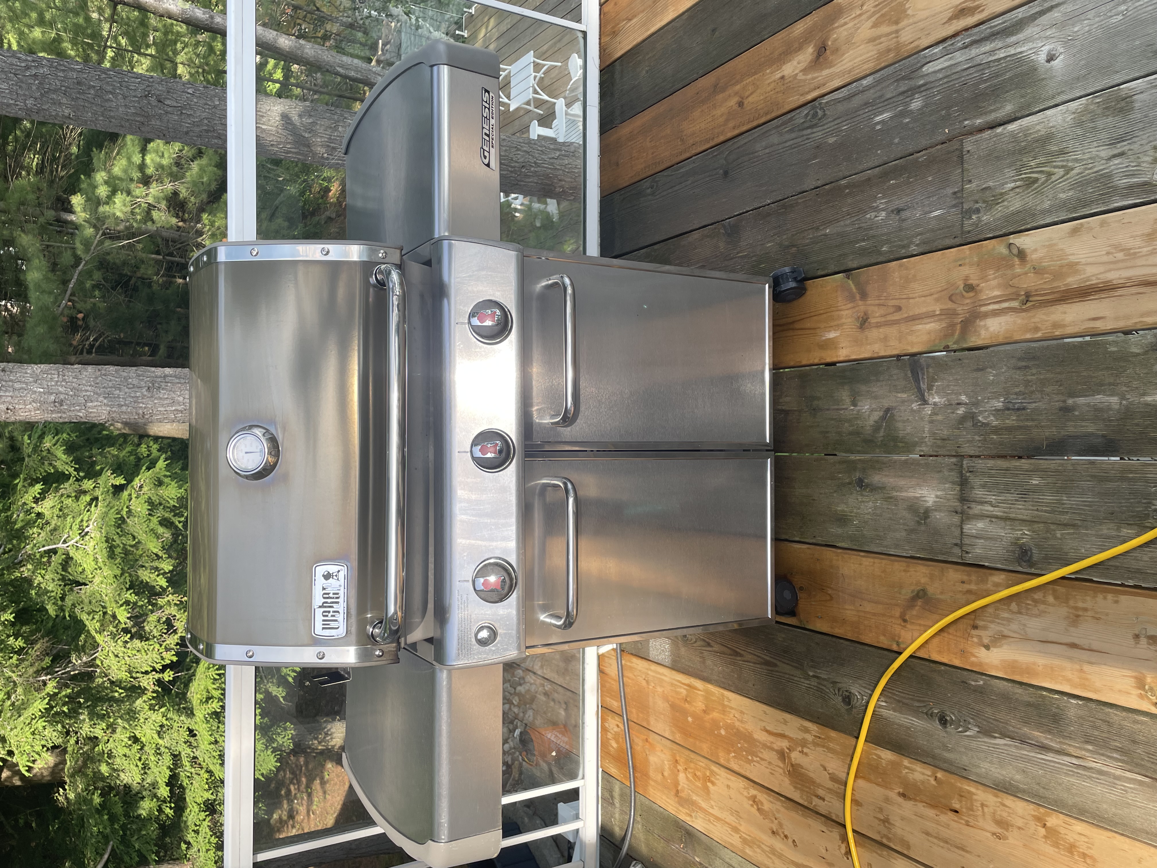 Weber BBQ cleaned and polished on a cottage deck
